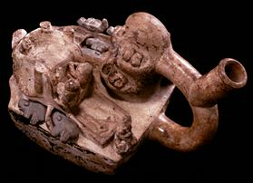 This 2000-year old ceramic pot depicts rocks covered by guano