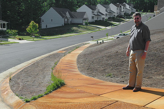 Iron-stained sidewalks and dead grass, 2003