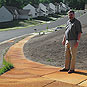 Iron-stained sidewalks and dead grass, 2003